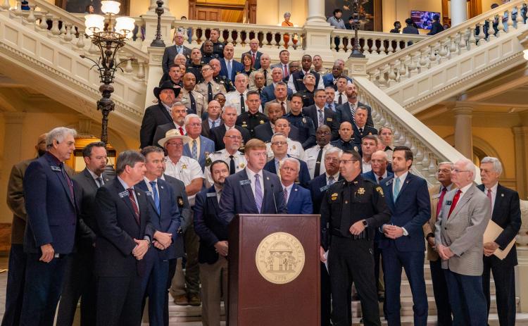 Stephens County Sheriff Rusty Fulbright visited the Capitol last week to support House Bill 973, which would provide for the state’s mental health hospital. He is standing about seven rows back near the center on the staircase.