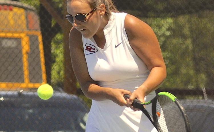 Makayla Rogers gets ready to hit the ball back over the net during the playoffs.