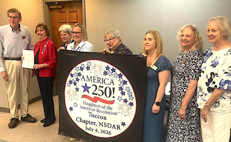 The Toccoa City Commission on Monday approved a proclamation recognizing the work of the local chapter of the Daughters of American Revolution (DAR) in promoting the upcoming 250th birthday of the United States of America. Toccoa Mayor Evan Hellenga, on the left end, presented the proclamation to DAR members in attendance at Monday’s meeting.