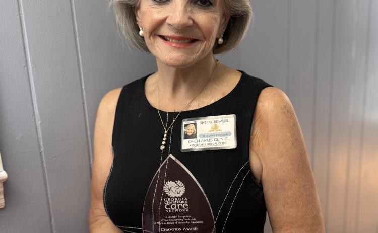 Sherry Beavers, executive director of the Open Arms Clinic in Toccoa, was the winner of the Georgia Charitable Care Network's Champion Award.