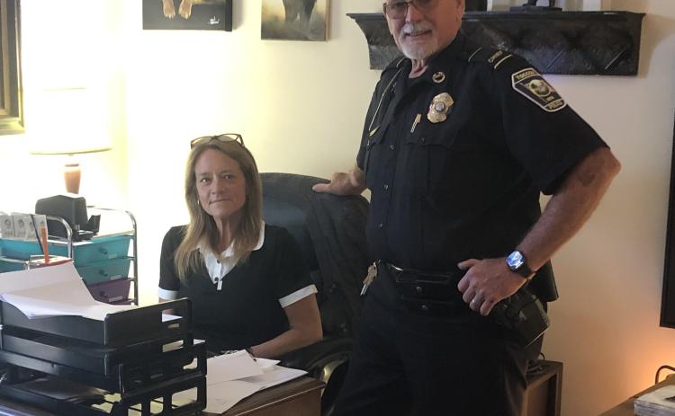 Lynn Walton, left, and Toccoa police chief Bruce Carlisle, right, are spearheading an effort to get the Toccoa Police Department state certified.