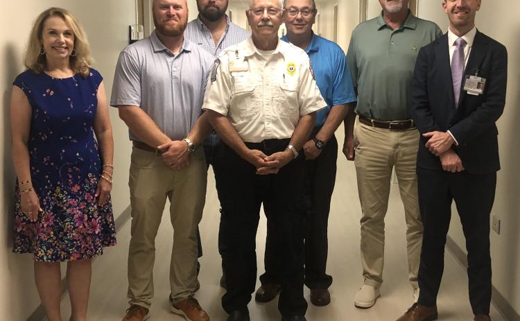 The Stephens County Hospital Authority honored Aaron Wilkinson at its monthly meeting on Thursday, Aug. 20. Pictured from left to right are Phyllis Ayers, Mak McAllister, Bo Dotson, Wilkinson, Clay Fisher, Hospital Authority chair Rick Phillips, and Stephens County Hospital CEO Van Loskoski.