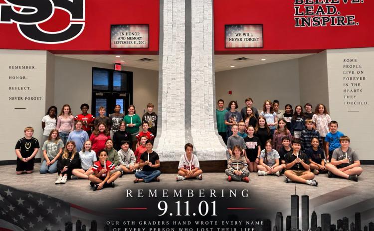 On Friday, students from Stephens County Middle School's sixth grade social studies class came together to create this memorial on the 25th anniversary of the World Trade Center attacks.