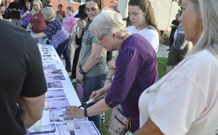 On Sunday, Aug. 30, Hope for a Drug Free Stephens held its fourth annual remembrance event at the Tugalo Greenspace.Among those in attendance was Kathy Petraeus, seen here lighting a candle in memory of her son, Logan.