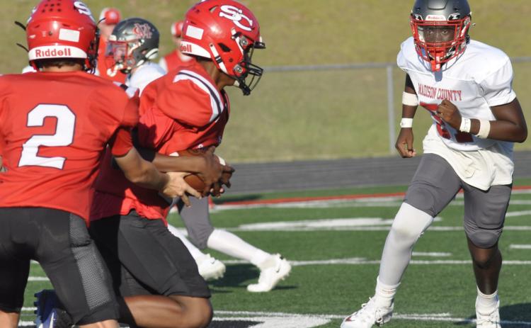 Keegan Howard takes a handoff.
