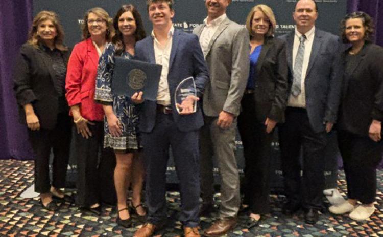 Connor Wallace, a senior student at Stephens County High School, was named the Georgia Work-Based Learning Student of the Year on Thursday, Sept. 24. With him are Jennifer Blasingame, Stephens County Schools System superintendent Connie Franklin, Melissa Wallace, Stephen Wallace, SCSS CTAE director Joni Whitfield, SCHS teacher Jeffrey Lovegrove, and SCHS principal Jessica Simmons.