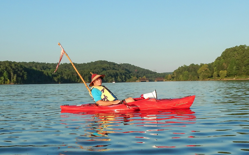 Local historian Kelly Vickers leans back and soaks in the beauty that is the Tugaloo River Sunset Paddle held the Saturday before Labor Day.