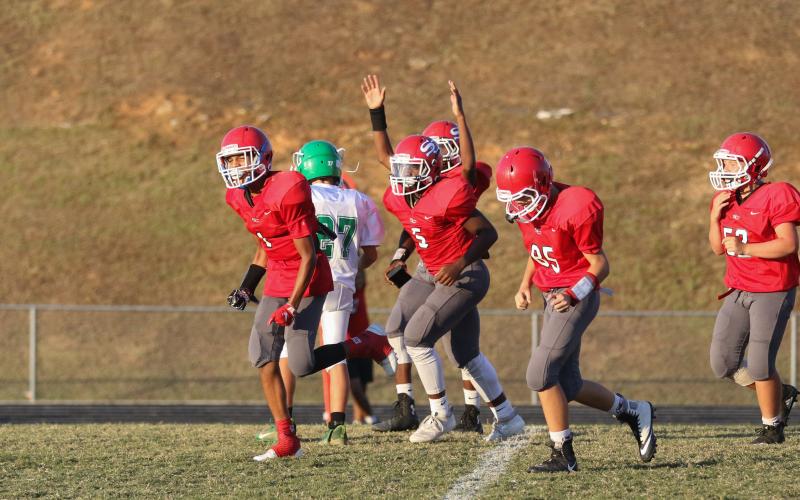 Jasec Smith celebrates historic field goal with Stephens County Middle school teammates - Courtesy of   David Byargeon