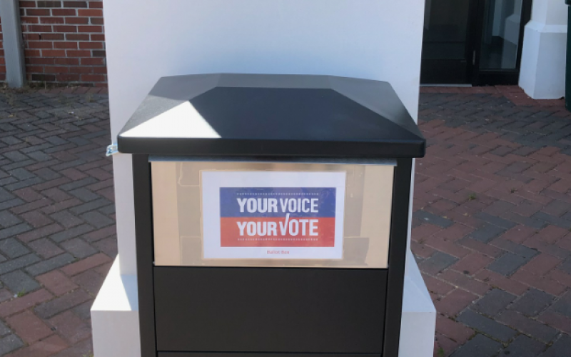 Voters can drop their absentee ballots into this receptacle located in front of the government building on Alexander Street.