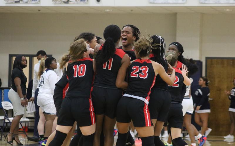 SCHS girls basketball celebrates win against East Jackson