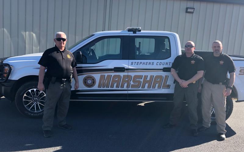 Stephens County has expanded its county marshal services from two to three marshals. They are (from left) chief Tony Addison, Joe Smith  and Rik Wise.