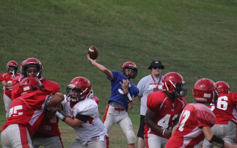 Branson Stowe throws a pass during a SCMS practice.