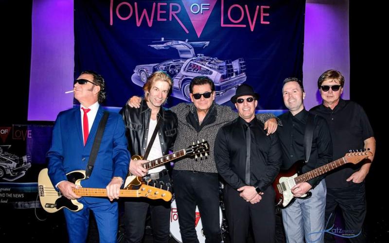 he Power of Love is a group of masterful, talented musicians performing the greatest hits of the most beloved and iconic acts in music history. Huey Lewis and the News’ 1983 album Sports, sold more than 10 million copies. Lead singer of Power Love is Tommy C (center).
