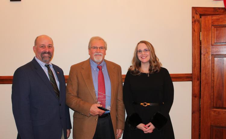 Dean Scarborough (center) received the council member of the year award from the Georgia Mountains Regional Commission. Making the presentation were GMRC chairman Sam Norton (left) and GMRC executive director Heather Feldman (right).