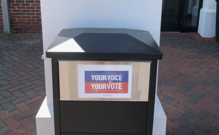 Voters can drop their absentee ballots into this receptacle located in front of the government building on Alexander Street.