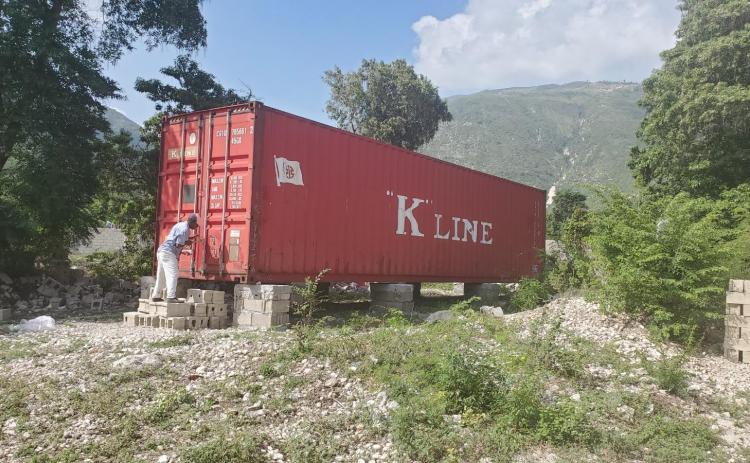 Love Him Love Them’s first shipping container filled with medical supplies was eagerly and quickly unloaded in Haiti last year.