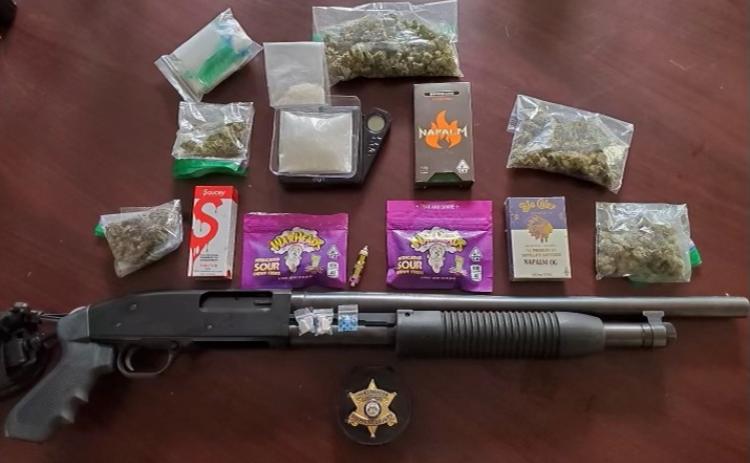 These are some of the items deputies seized during an arrest early Monday. They include suspected drugs and paraphernalia as well as a shotgun.