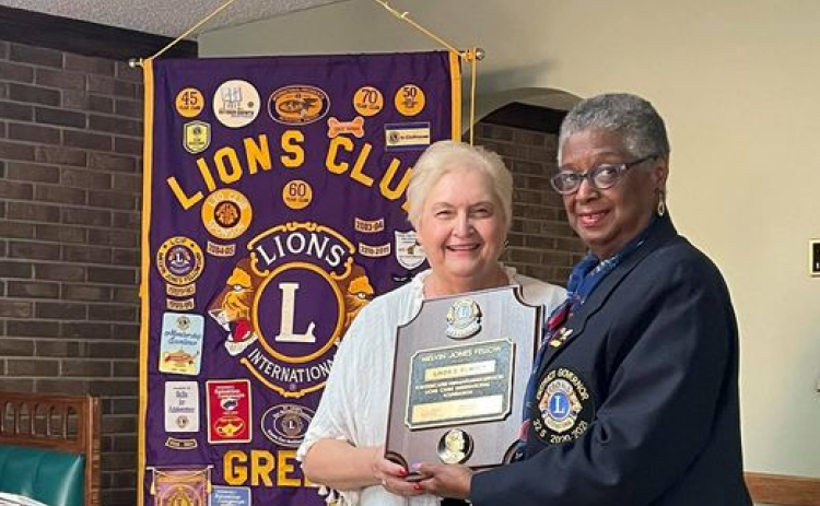 Linda Rumsey (left) was named a Lions Melvin Jones Fellowship honoree in April. That’s District Gov. Judy Scott making the presentation.