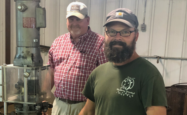 Pictured are Stephens County agriculture teacher Brad Dalton (left) and new cannery supervisor Richard Johnson.