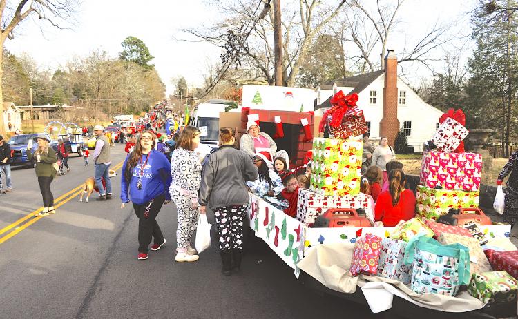 Enthusiasm surges along Doyle Street as the 2020 Toccoa Christmas Parade is just minutes away from starting. This year’s parade will be held Saturday, Dec. 4, at 10 a.m.