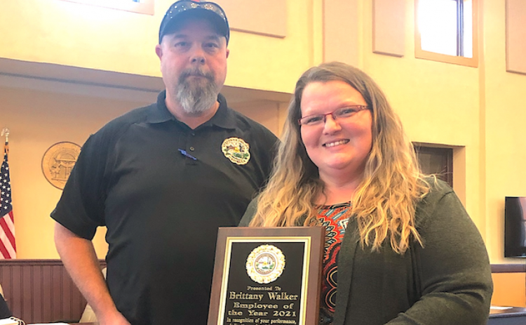 Brittany Walker (right), assistant administrator of public works, recently received the 2021 employee of the year award from the Stephens County Board of Commissioners. Pictured with her is public works director Jason Holland.